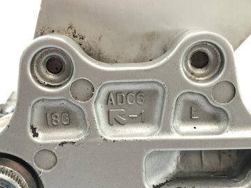 Suzuki GSX R 1000 WVBZ K3 [2003] - Footrest system driver's left footrest holder with shift lever - 0