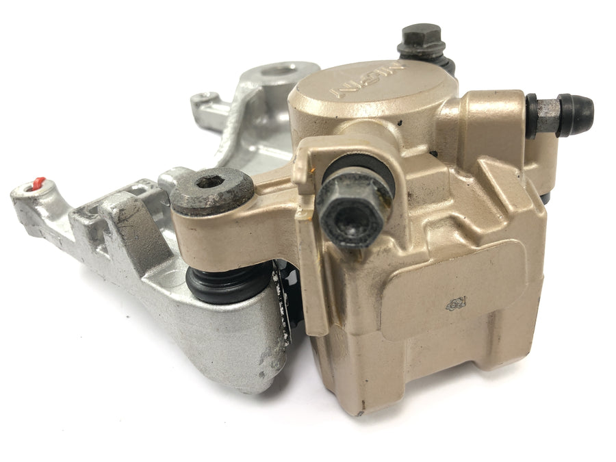 Honda XRV 750 Africa Twin RD04 [1992] - Rear brake caliper Nissin with anchor plate